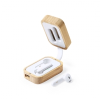 Caja de auriculares con auriculares y base generador de carga en color blanco.