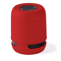 Altavoz rojo y negro con botones de funciones al centro.