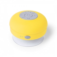 Altavoz de color amarillo de forma circular con botones indicador de funciones al centro y a los lados. 