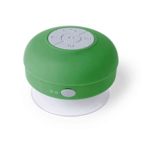 Altavoz de color verde de forma circular con botones indicador de funciones al centro y a los lados. 