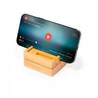 Teléfono posicionado en horizontal, sobre caja organizadora de madera.