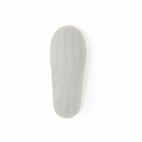 Parte trasera de pantuflas de color natural. 